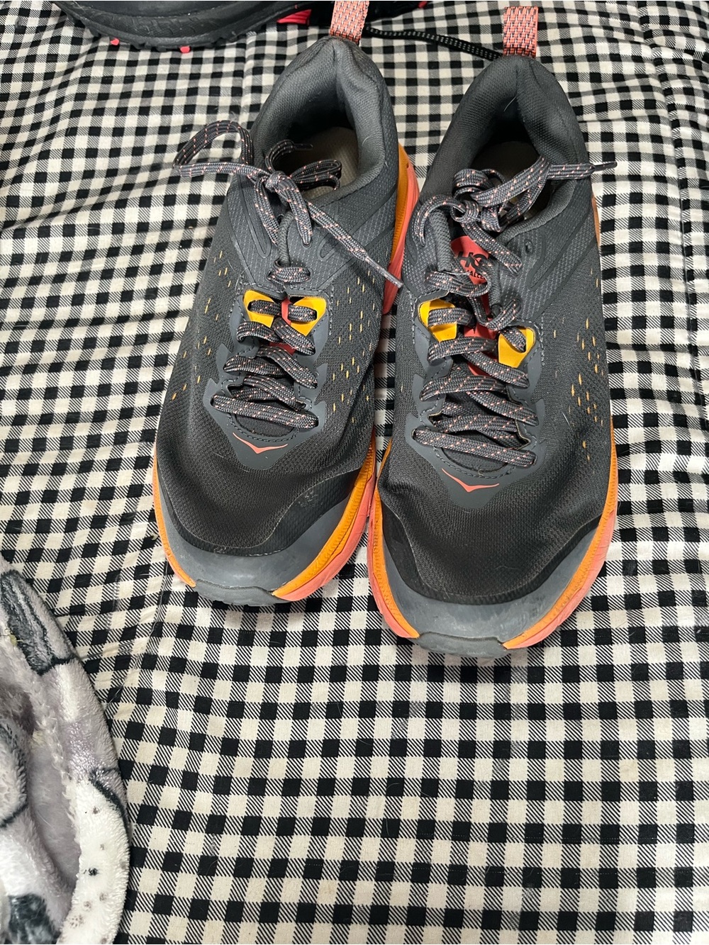 Hoka women’s Gray and Orange Trail Running Shoes